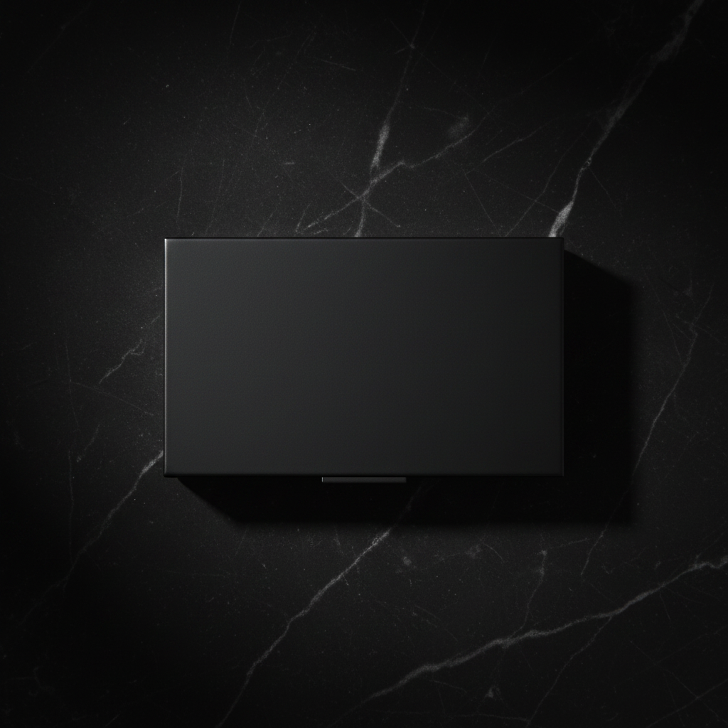 Shadow Edit Six-Pan Palette matte black compact closed, overhead flat lay on marble